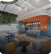Modern common meeting room with vibrant accent walls and open workspace layout